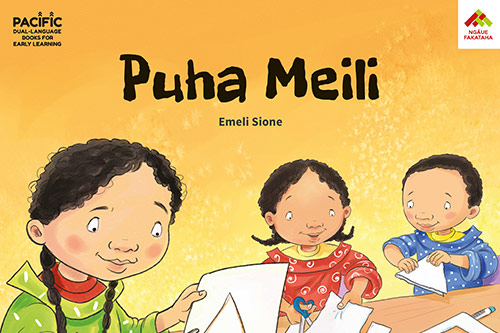  Three children cutting out shapes from paper on the cover of the book