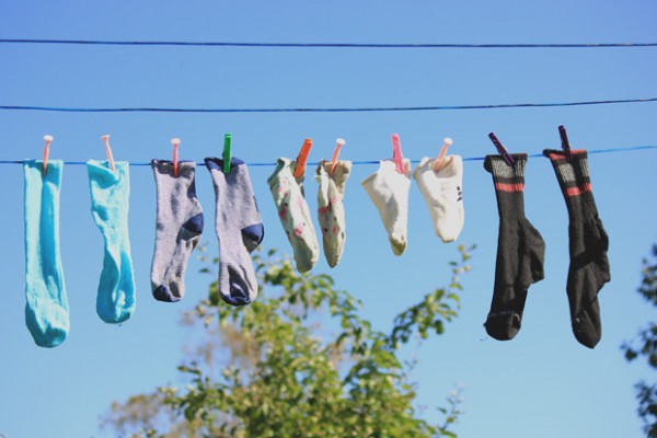 socks hanging on a clothesline