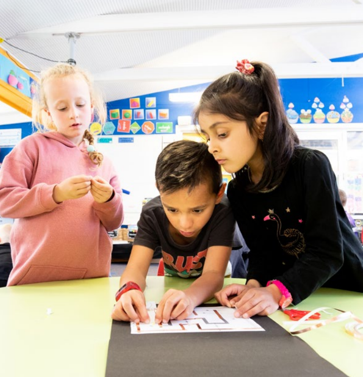 Three students working together.jpeg