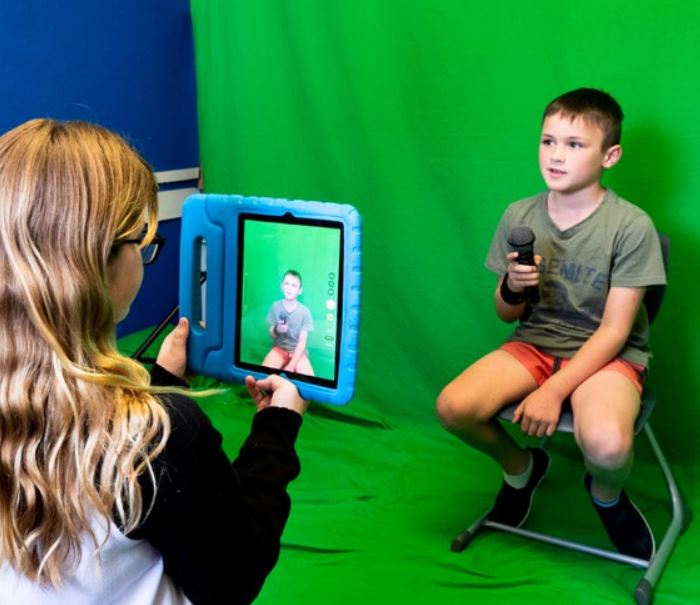 Two students filming with an iPad .jpeg