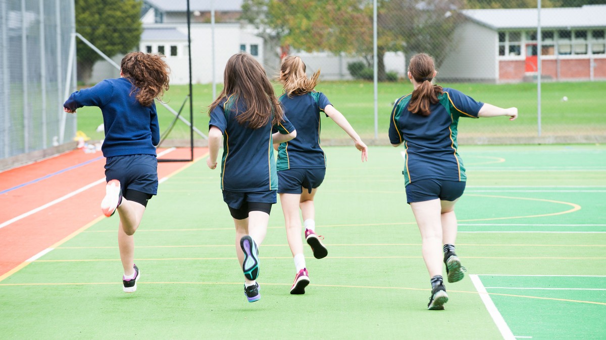 Four girls running.