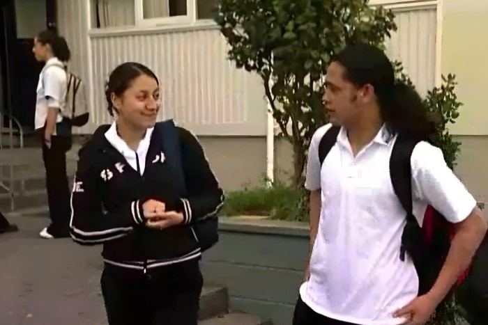 Haami speaking to Hana at school. 