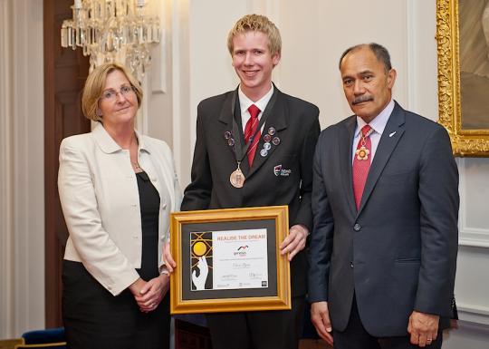 Chris receiving his award.