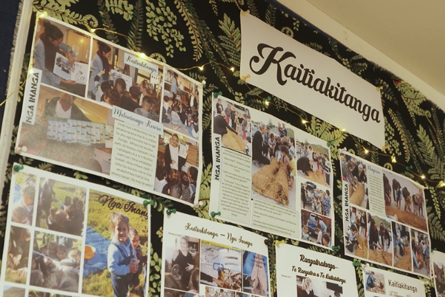 A wall display in the early childhood service that celebrates the ways tamariki and whānau care for the environment.