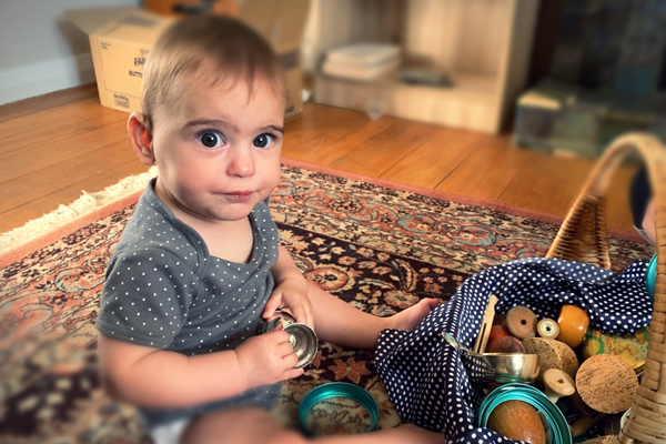 Toddler on floor playing 