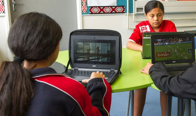 Students learning on their computers.