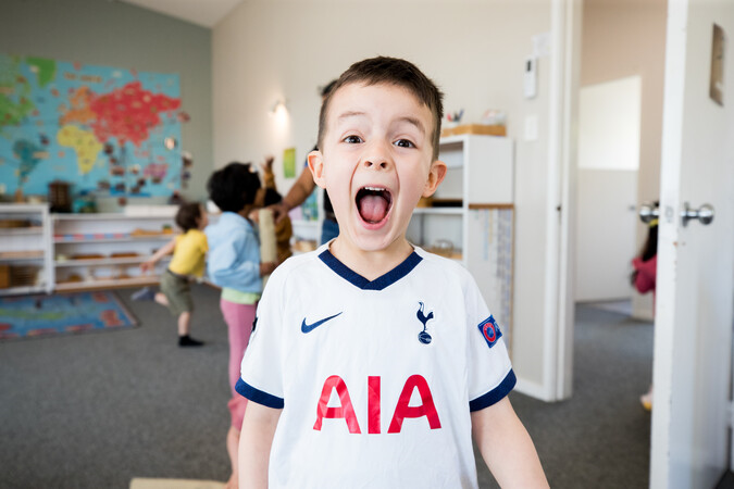 Happy child at a home based early childhood education centre.png