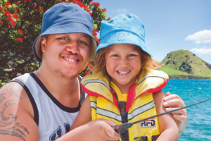 Adult and child with fishing rod