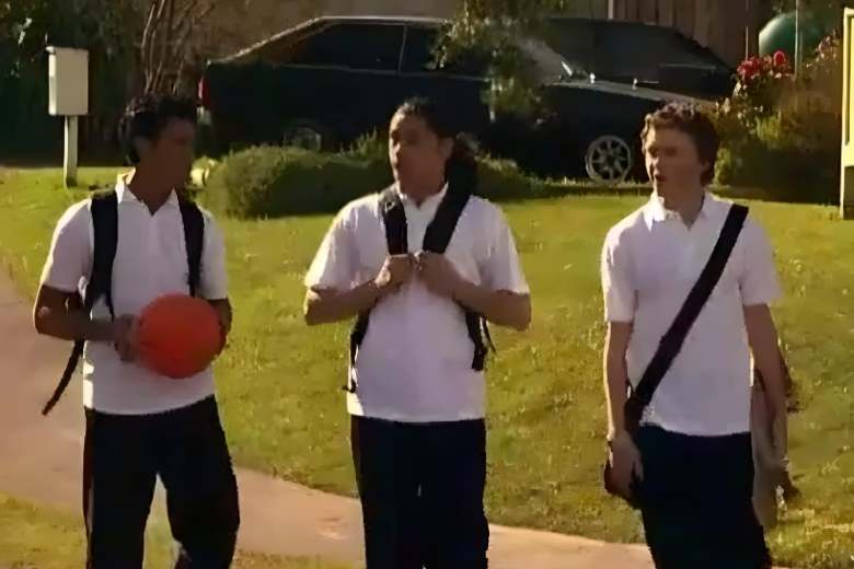 Dylan, Haami and Sione walking to school. 
