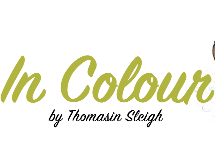 The words 'In Colour' in linked format and green colour