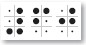 White sheet with ten large black dots and eight small dots.