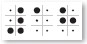 White sheet with eight large black dots and ten small dots.