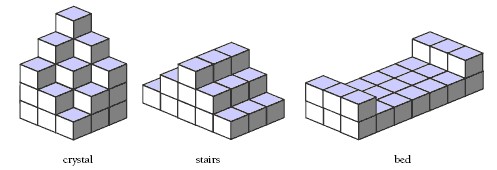 Cubes stacked to form 3 different shapes including a crystal, stairs, and a bed. 