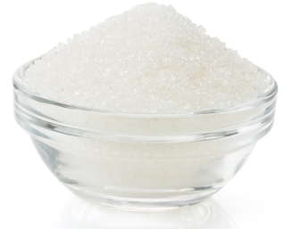 A clear bowl fill of white sugar.