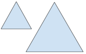 A small and a larger blue triangle next to each other.