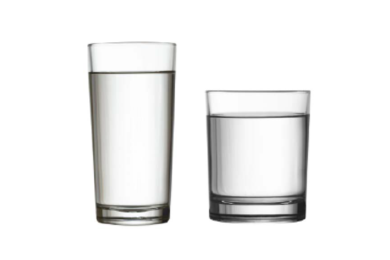 A tall and skinny glass cup adjacent a short and wide glass cup.