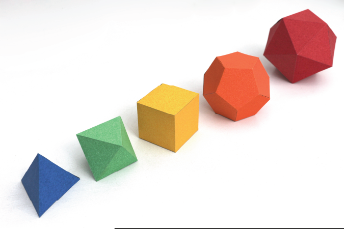 Five different coloured, 3-dimentional polygons.