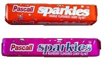 Pascall packets of orange and raspberry flavoured candy.