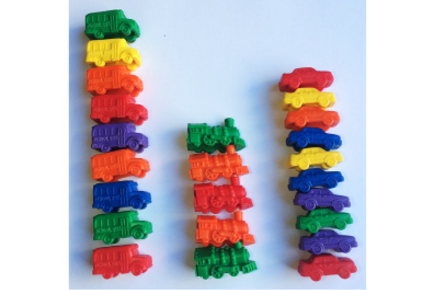 Three lines of multicoloured toy vehicles.