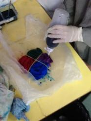 Dye being applied with a squirter bottle.