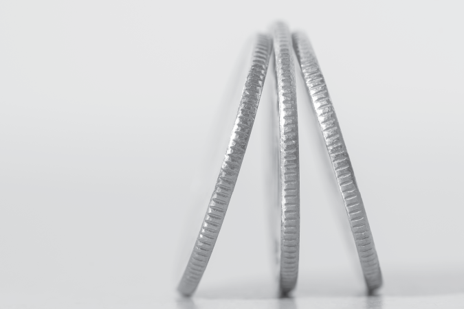 Three coins on a table