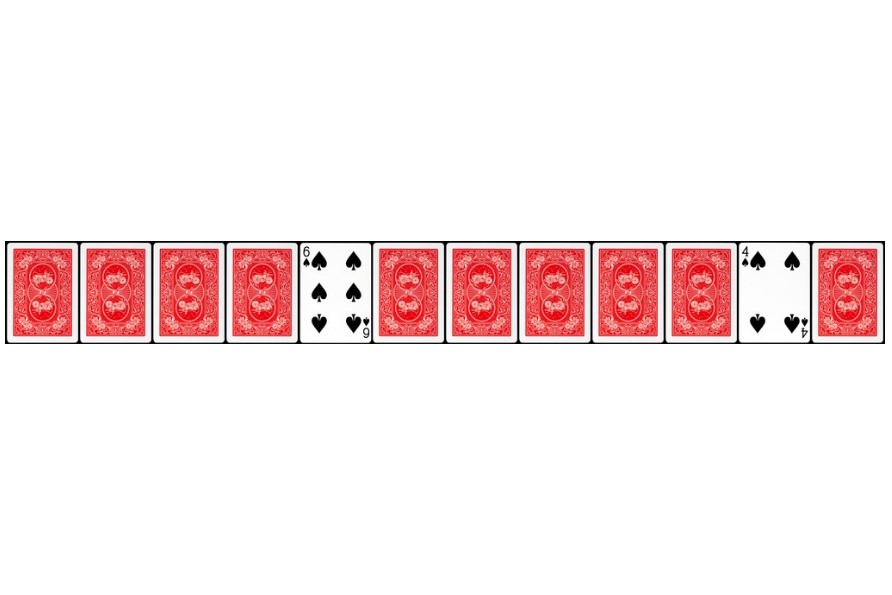 A suit of cards flipped over, apart from a 6 and 4 of spades. 