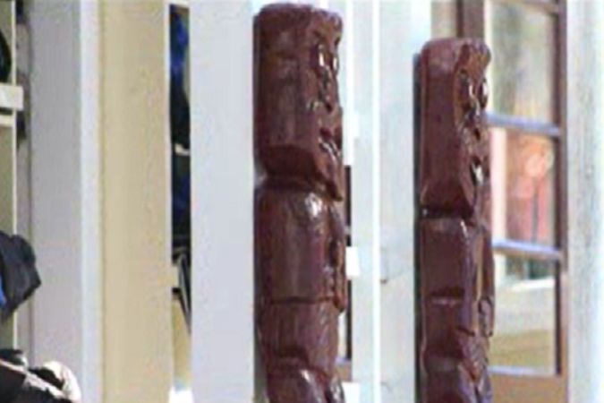 Two traditional Māori wooden carvings.