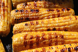 Corn cooking on a BBQ