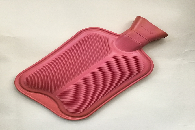 A red hot water bottle.