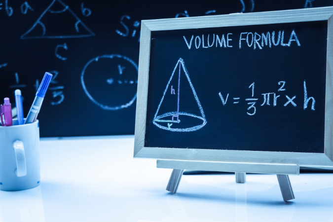 Volume formula written on a blackboard.