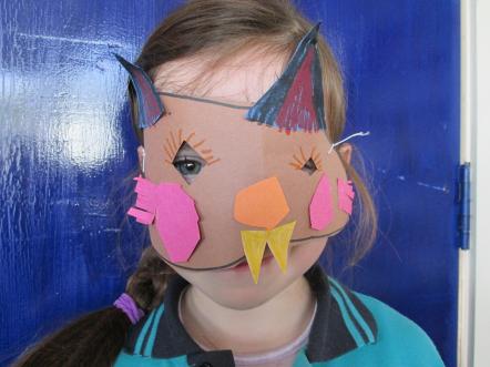 A student wearing her cat mask.