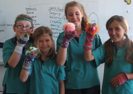 Students with their sock puppets.