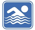 A blue water safety sign depicting a person swimming in the ocean.