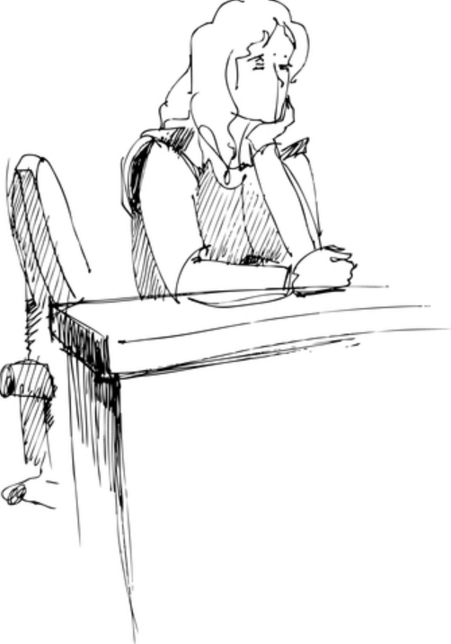 A sketch of a teacher sitting at their desk.