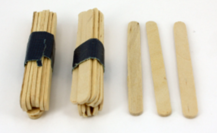 Two bundles of ten sticks, and three individual sticks.
