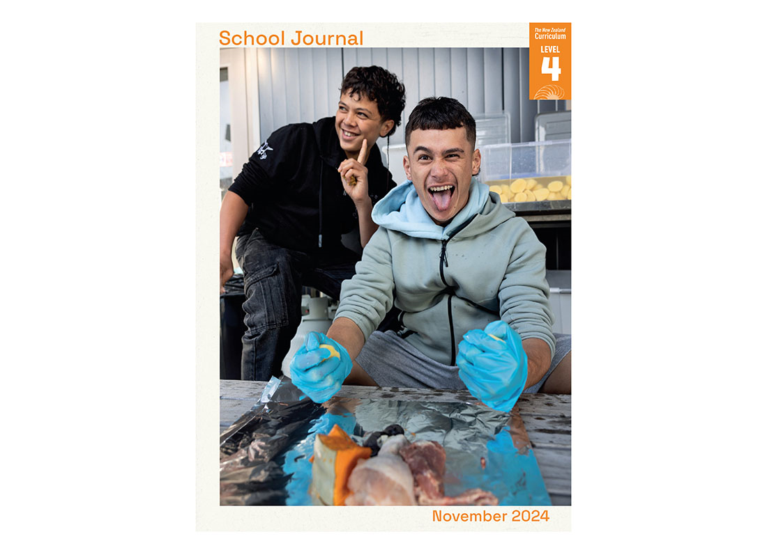 Book cover for School Journal Level 4 November 2024. Cover shows a photo of two boys enjoying the preparation of a hāngī.